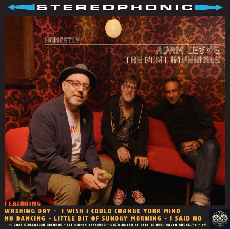 Adam Levy and The Mint Imperials on red couch